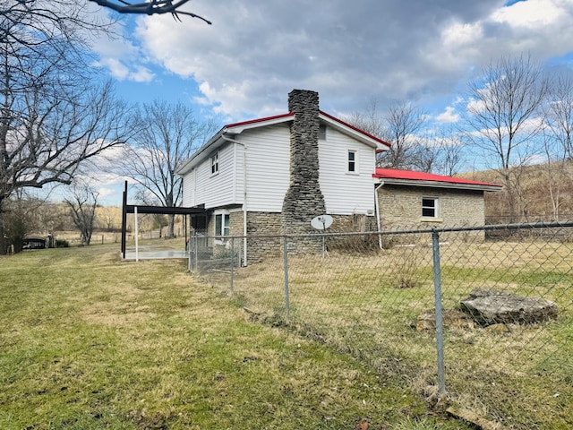 view of home's exterior featuring a lawn