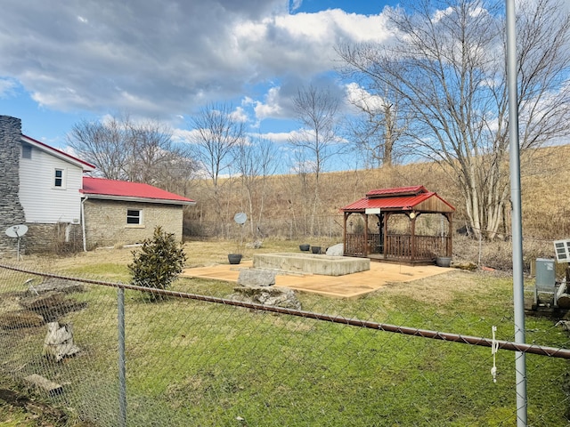 view of yard featuring a gazebo and a patio area