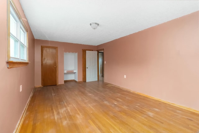 unfurnished bedroom featuring light hardwood / wood-style floors