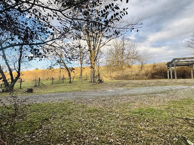 view of patio with a rural view