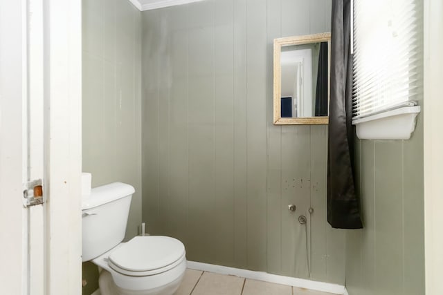 bathroom featuring tile patterned floors and toilet