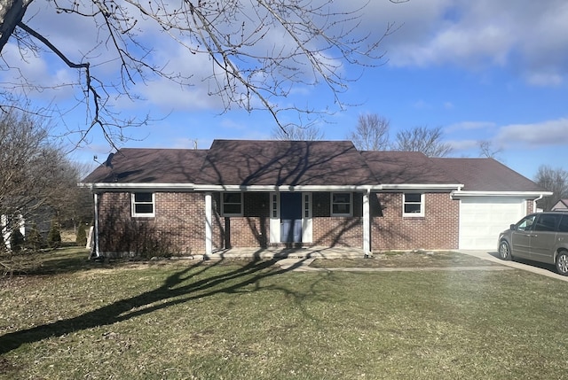 single story home with a garage and a front yard