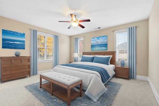 carpeted bedroom featuring ceiling fan