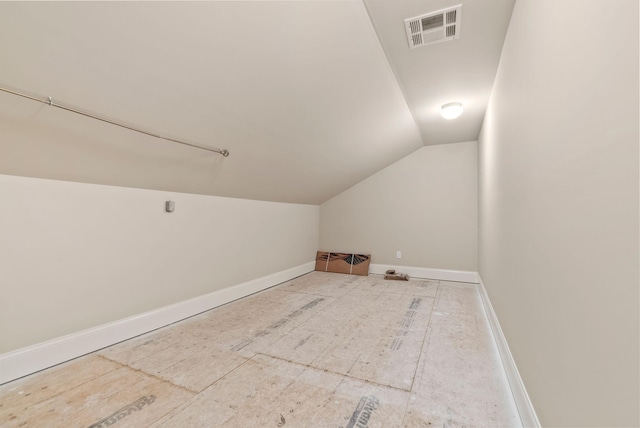 bonus room featuring lofted ceiling