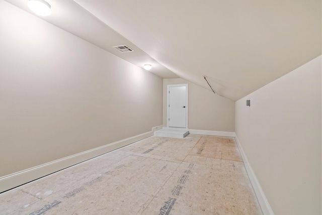 additional living space with lofted ceiling