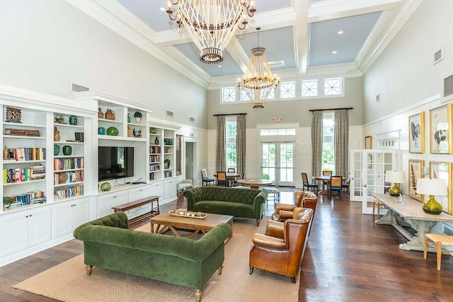 living room featuring dark wood-type flooring, beam ceiling, coffered ceiling, a notable chandelier, and french doors