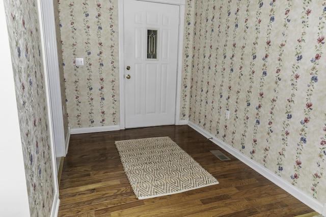 foyer with dark wood-type flooring