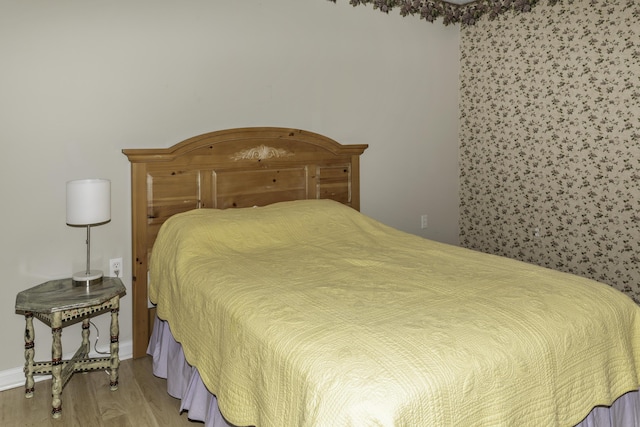 bedroom featuring hardwood / wood-style floors