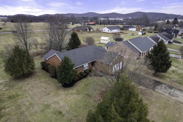 drone / aerial view featuring a mountain view