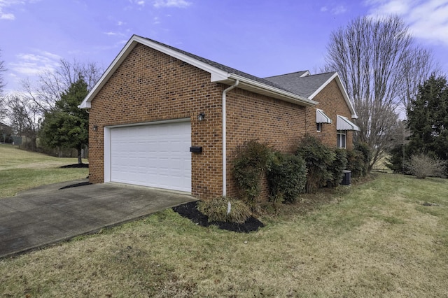 view of property exterior featuring a yard and a garage