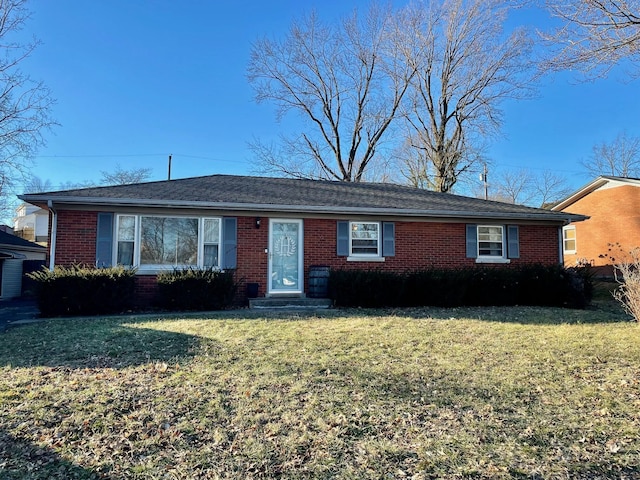 single story home featuring a front lawn