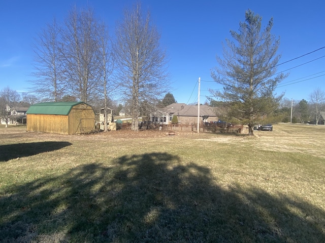 view of yard with a storage shed