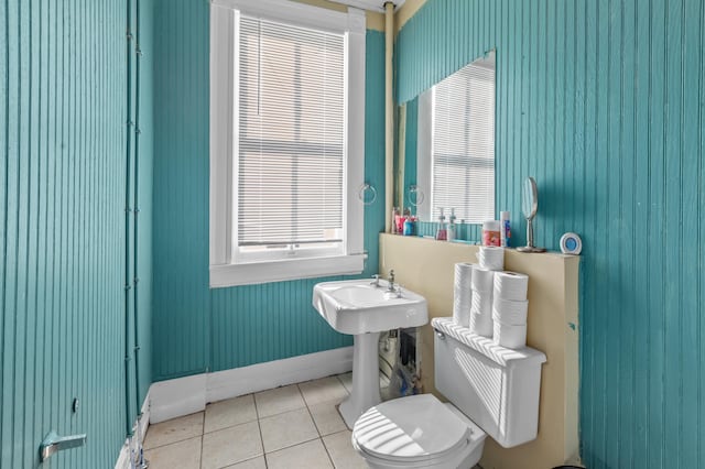 bathroom with tile patterned flooring and toilet