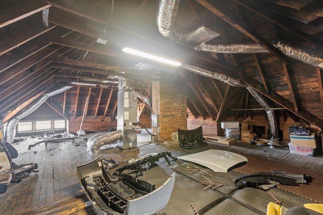 attic featuring heating unit