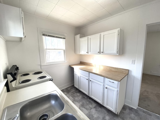 kitchen featuring sink, white cabinetry, ornamental molding, white electric stove, and exhaust hood