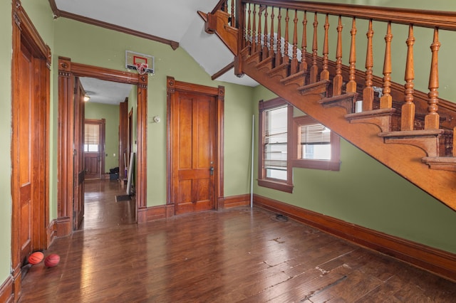 interior space with wood-type flooring and ornamental molding