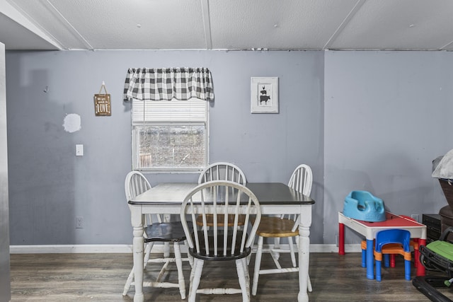 dining area featuring hardwood / wood-style flooring