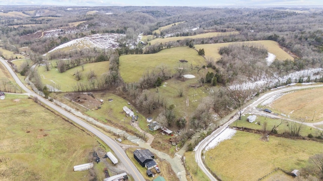 birds eye view of property featuring a rural view