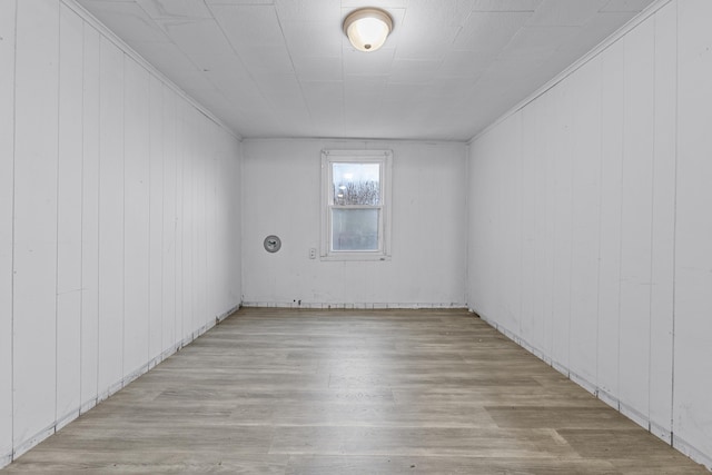 spare room with light wood-type flooring