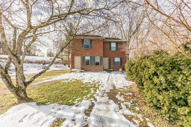 view of snow covered house