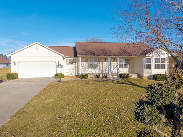 ranch-style home with a garage and a front yard