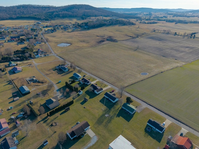 birds eye view of property featuring a rural view