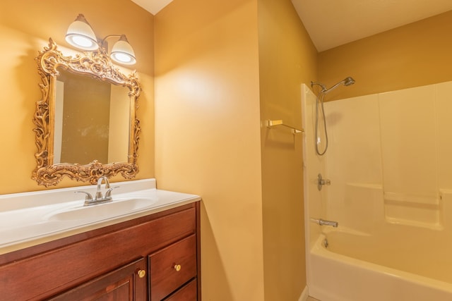 bathroom with shower / washtub combination and vanity