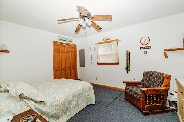 bedroom featuring electric panel, ceiling fan, and carpet flooring