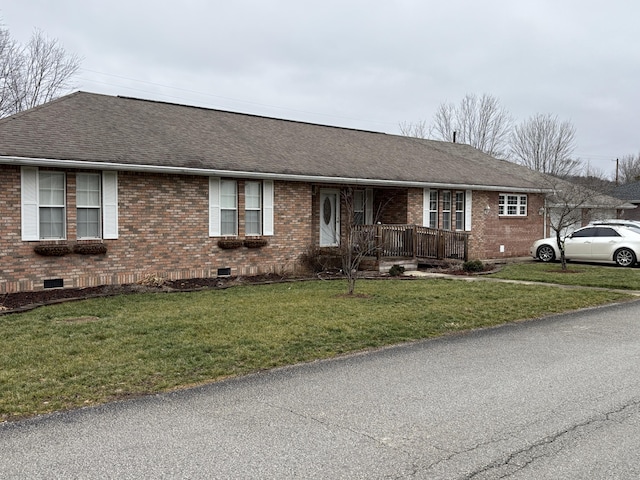 ranch-style home with a porch and a front yard