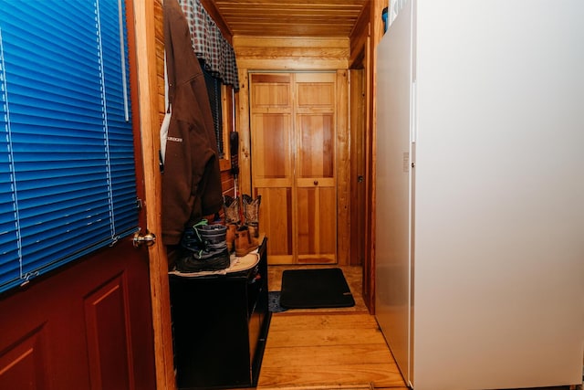 interior space featuring wood ceiling and light wood-type flooring