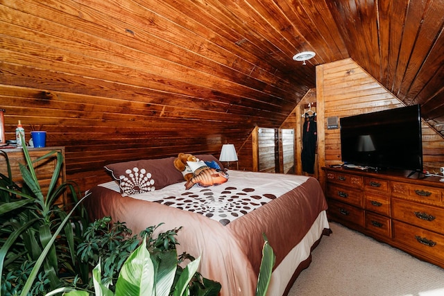 bedroom featuring wood ceiling, wooden walls, light colored carpet, and vaulted ceiling