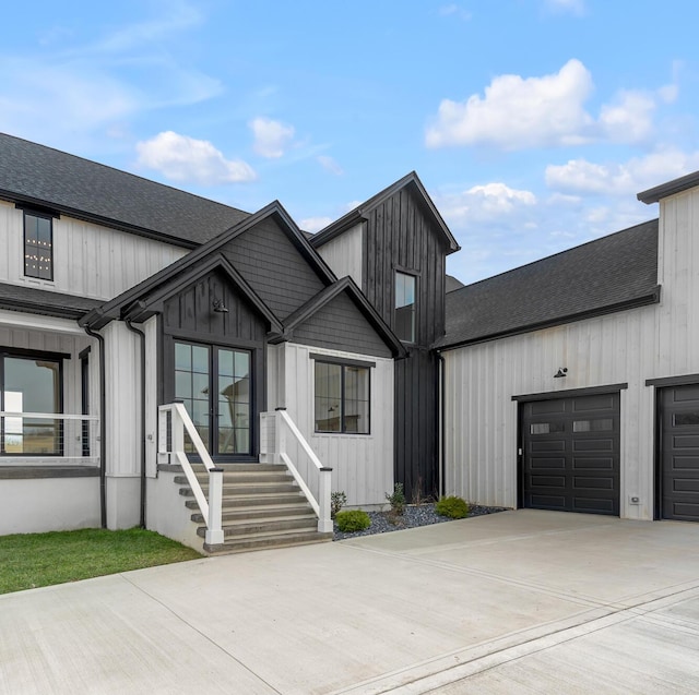 modern farmhouse featuring a garage