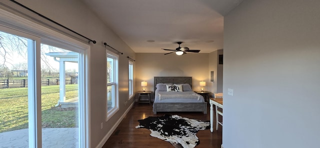 bedroom featuring dark hardwood / wood-style floors and ceiling fan