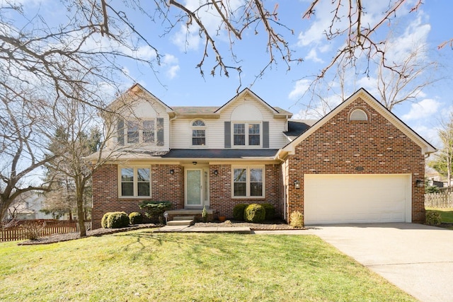 view of property featuring a garage and a front lawn