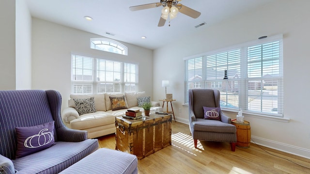 sitting room with light hardwood / wood-style flooring and ceiling fan