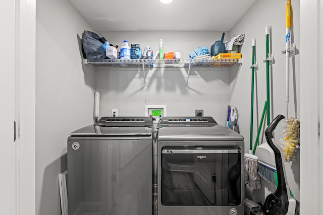 laundry room featuring laundry area and washer and clothes dryer