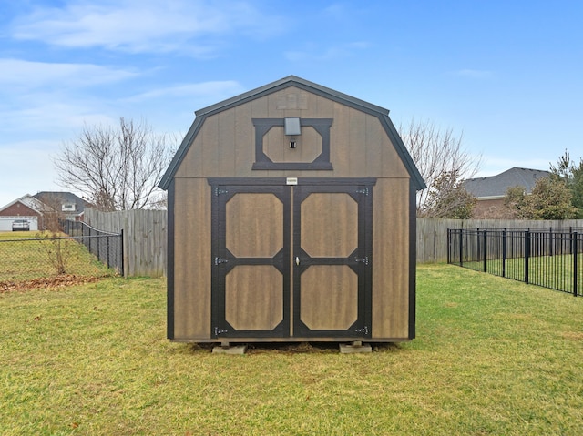 view of shed featuring a fenced backyard