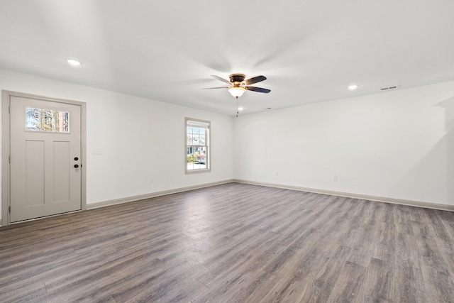 empty room with wood-type flooring and ceiling fan