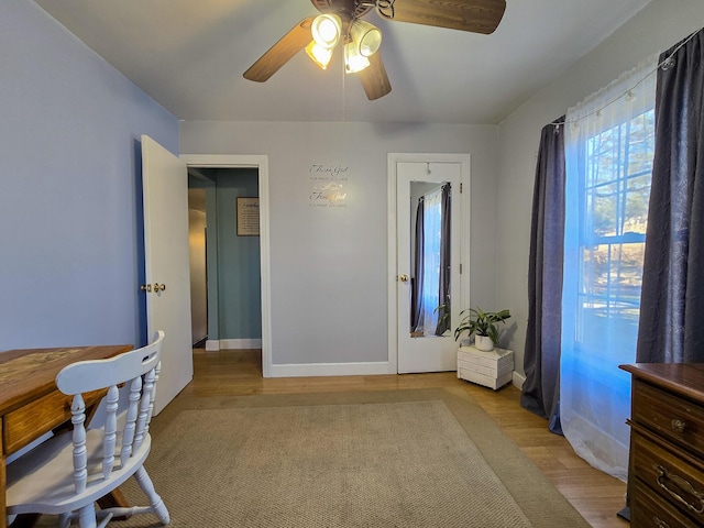 interior space featuring ceiling fan and light hardwood / wood-style flooring