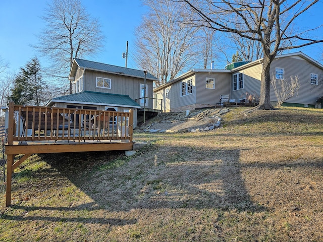 rear view of house with a deck