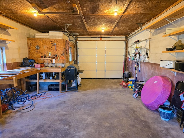 garage featuring a workshop area