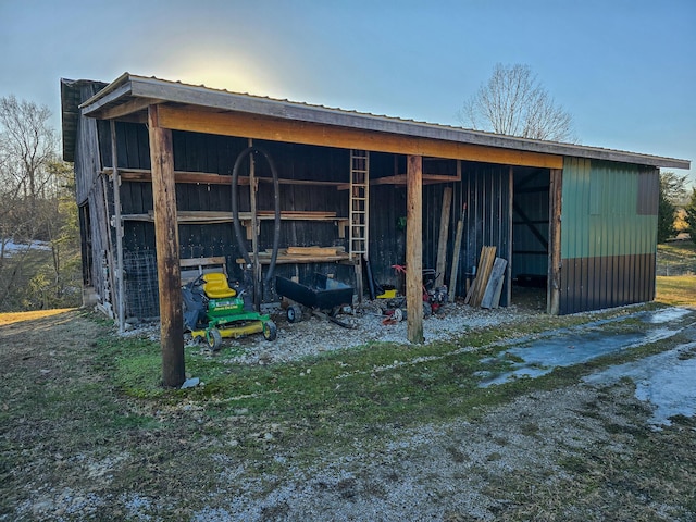 view of outdoor structure at dusk