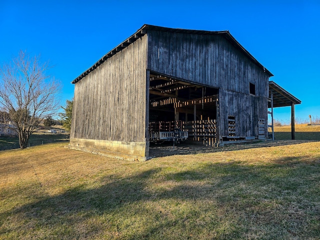 view of outdoor structure with a yard