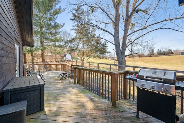 wooden deck with grilling area