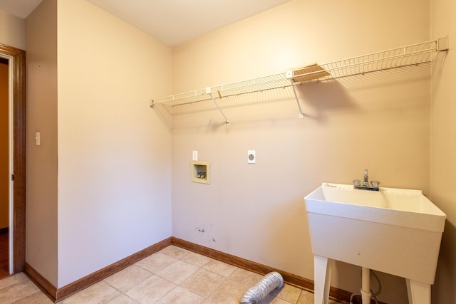 laundry room featuring light tile patterned flooring, hookup for a washing machine, sink, and electric dryer hookup