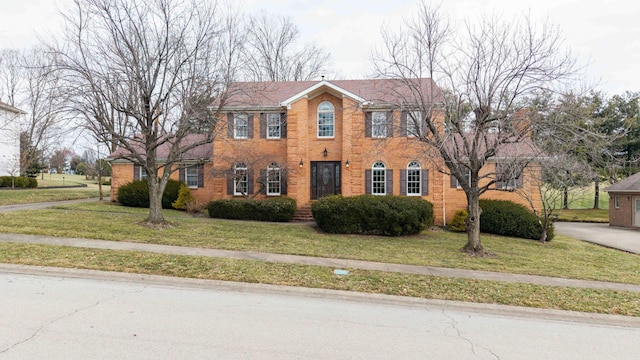 colonial house with a front lawn