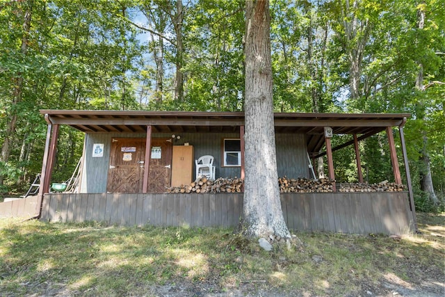 view of side of home with an outbuilding