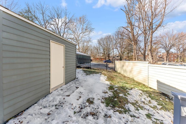 view of yard covered in snow