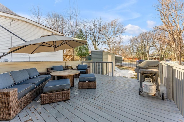 deck featuring an outdoor hangout area and a shed