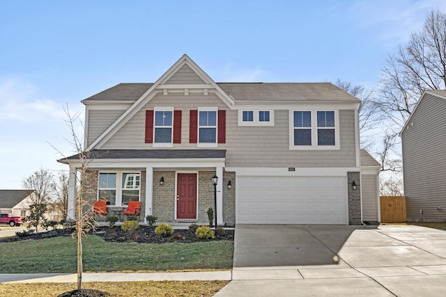 craftsman-style home with a garage and a front lawn